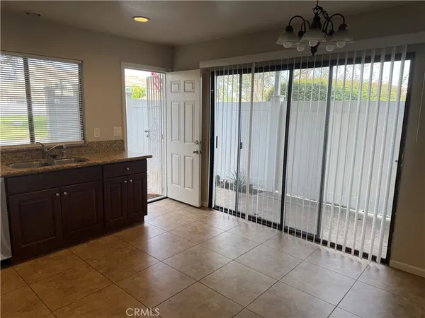 a spacious bathroom with a mirror and a shower