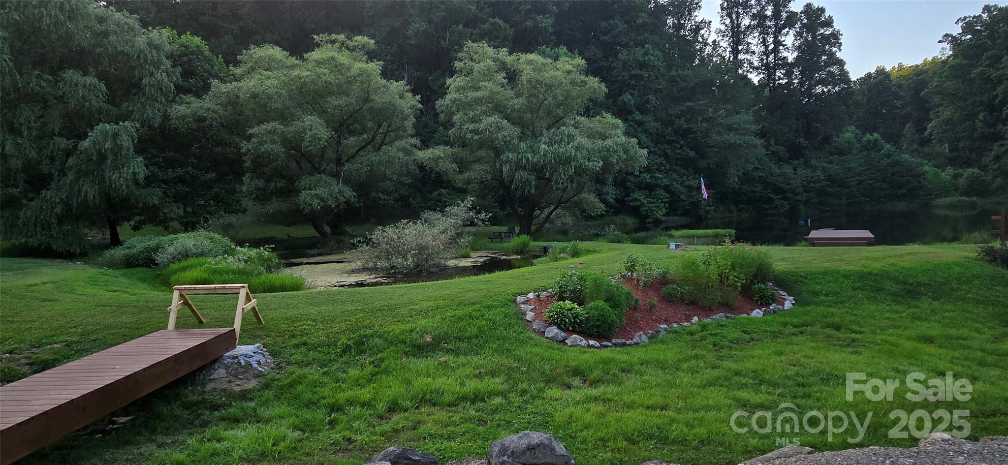 Lot 501 Spellbound Road Waynesville, NC 28785 - Photo 21 of 30 a view of a garden with a park