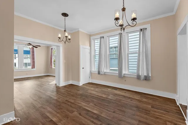 a kitchen with a refrigerator and a sink