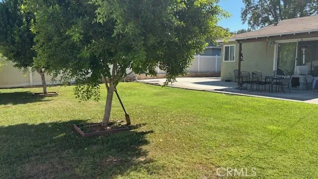 a view of a backyard with a slide