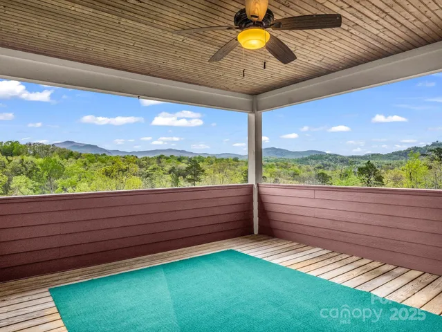 a view of a back yard from a balcony