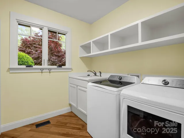 a utility room with dryer and washer