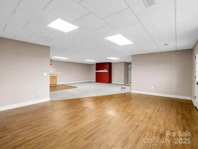 a view of a livingroom with wooden floor
