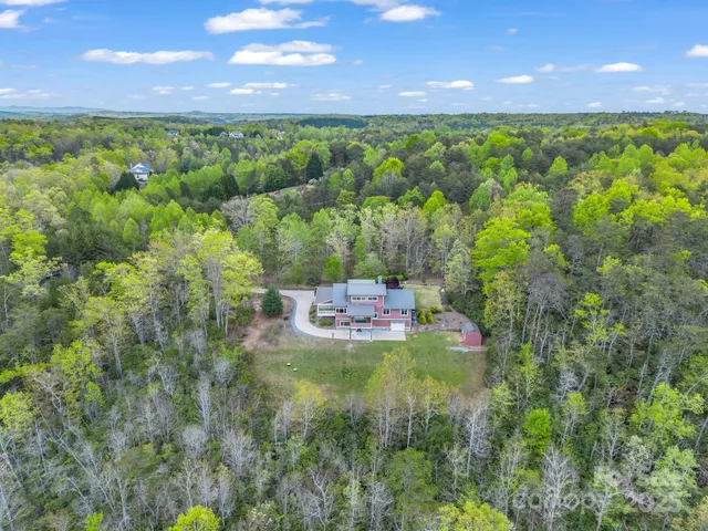 a view of a big yard with green space