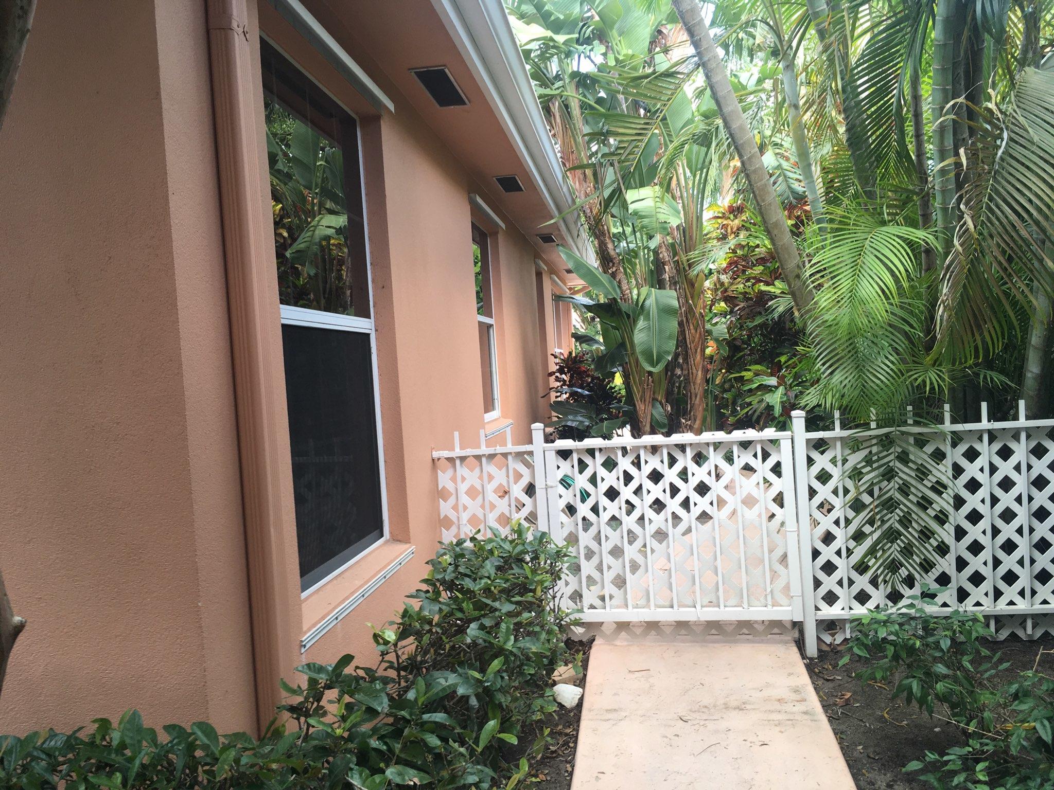 166 Hampton Place Jupiter, FL 33458 - Photo 11 of 11 166 Hampton Yard Entrance
