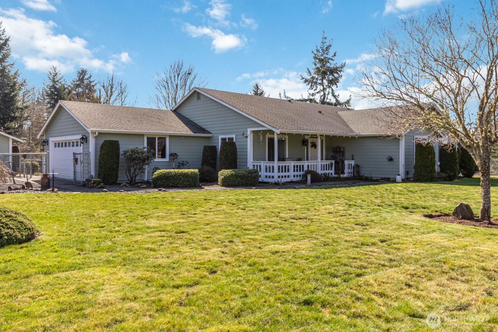413 Haywire Road Winlock, WA 98596 - Photo 3 of 40 a front view of a house with a big yard