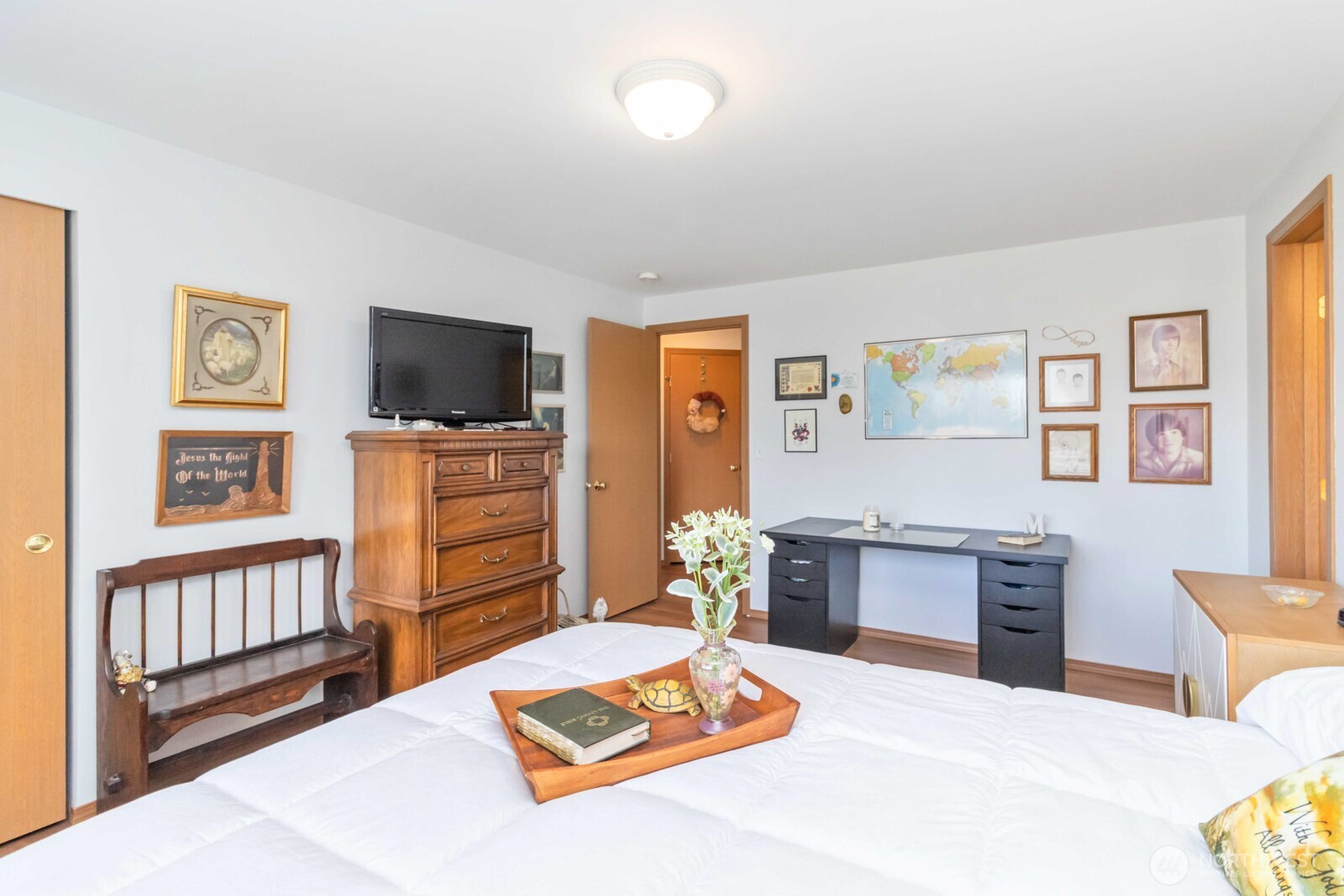 413 Haywire Road Winlock, WA 98596 - Photo 32 of 40 a bedroom with furniture and a flat screen tv