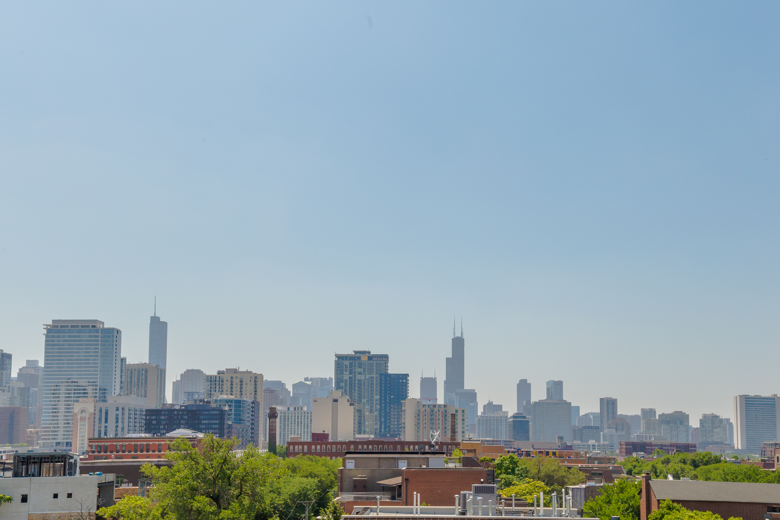 Undisclosed Address Chicago, IL 60610 - Photo 11 of 12 a view of a city with tall buildings in the background