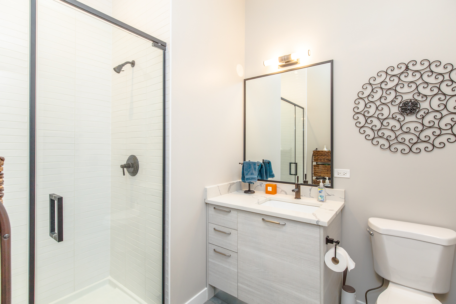 Undisclosed Address Chicago, IL 60610 - Photo 8 of 12 a bathroom with a sink vanity mirror and toilet