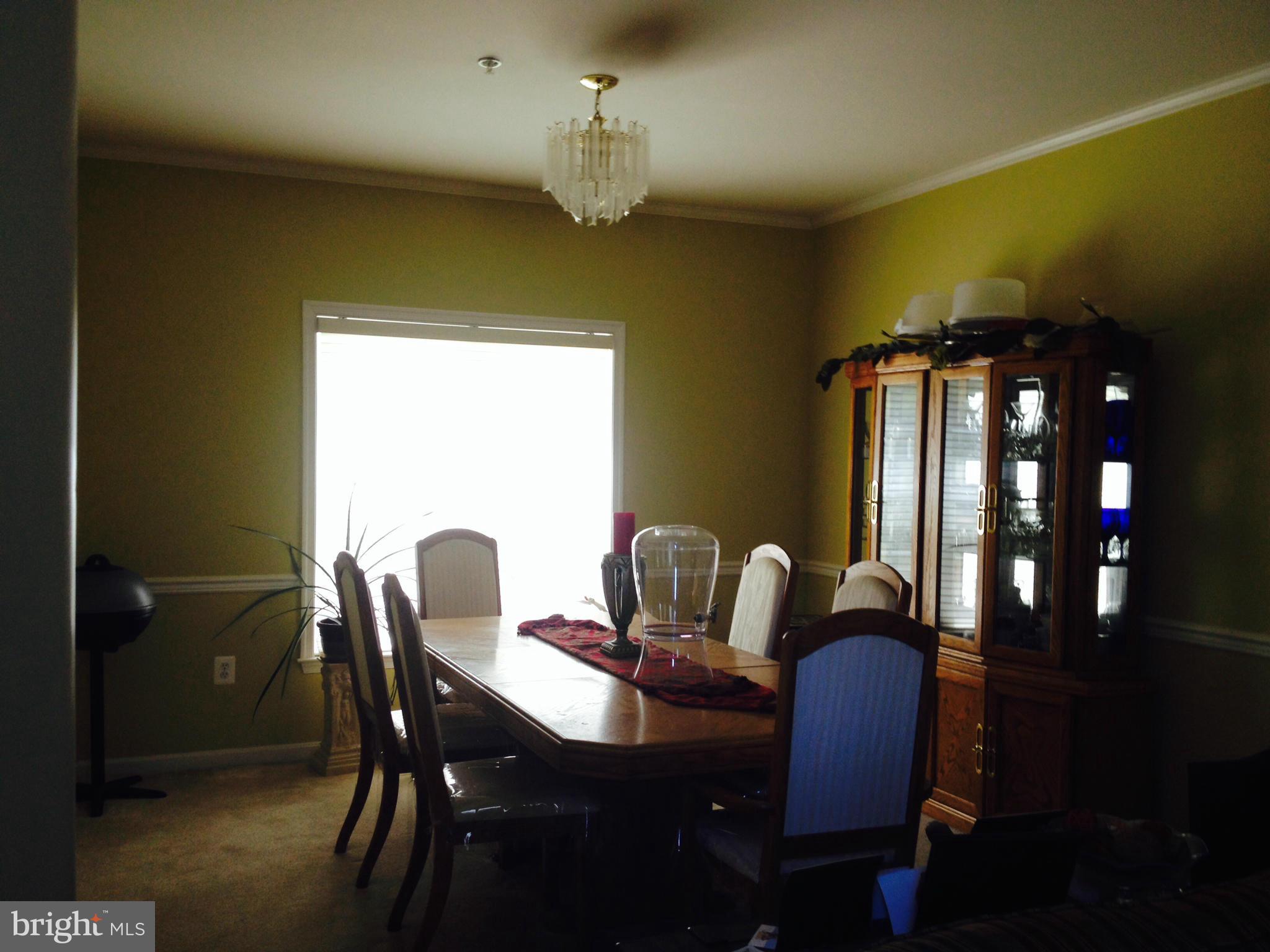 11709 Fort Washington Road Fort Washington, MD 20744 - Photo 3 of 23 a dining room with furniture and window