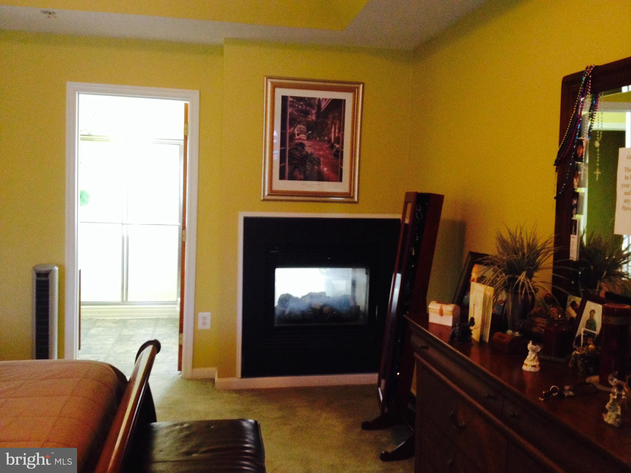 11709 Fort Washington Road Fort Washington, MD 20744 - Photo 8 of 23 a living room with furniture flat screen tv and a window