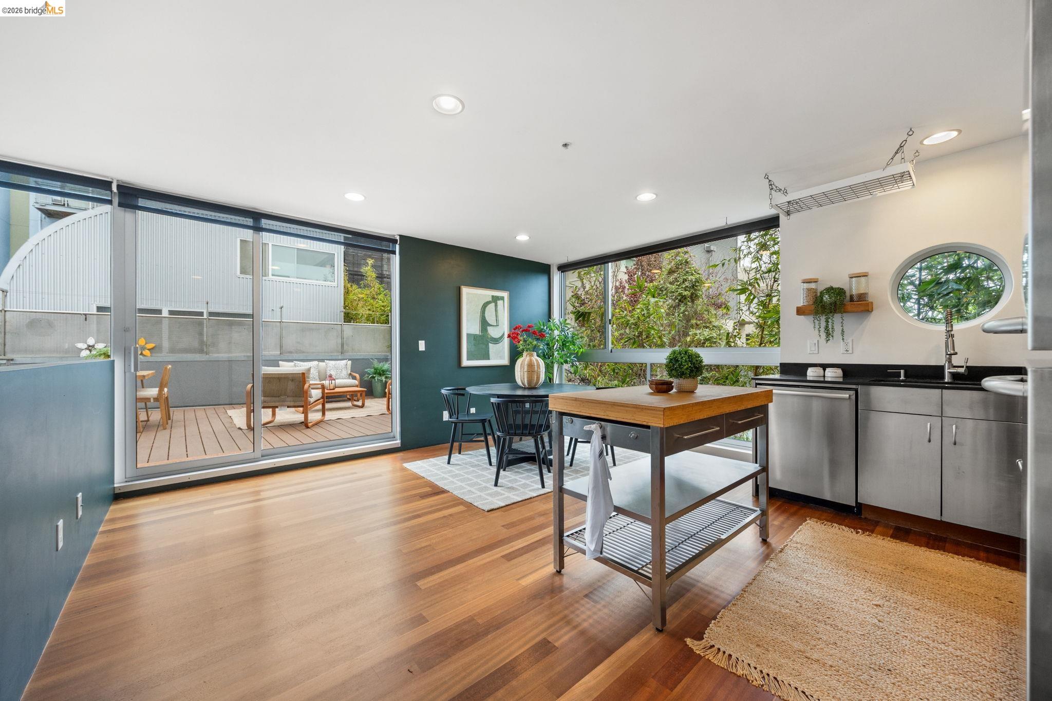 2709 Tenth Street, Unit D Berkeley, CA 94710 - Photo 12 of 29 Hardwood flooring throughout, leading to a private outdoor deck