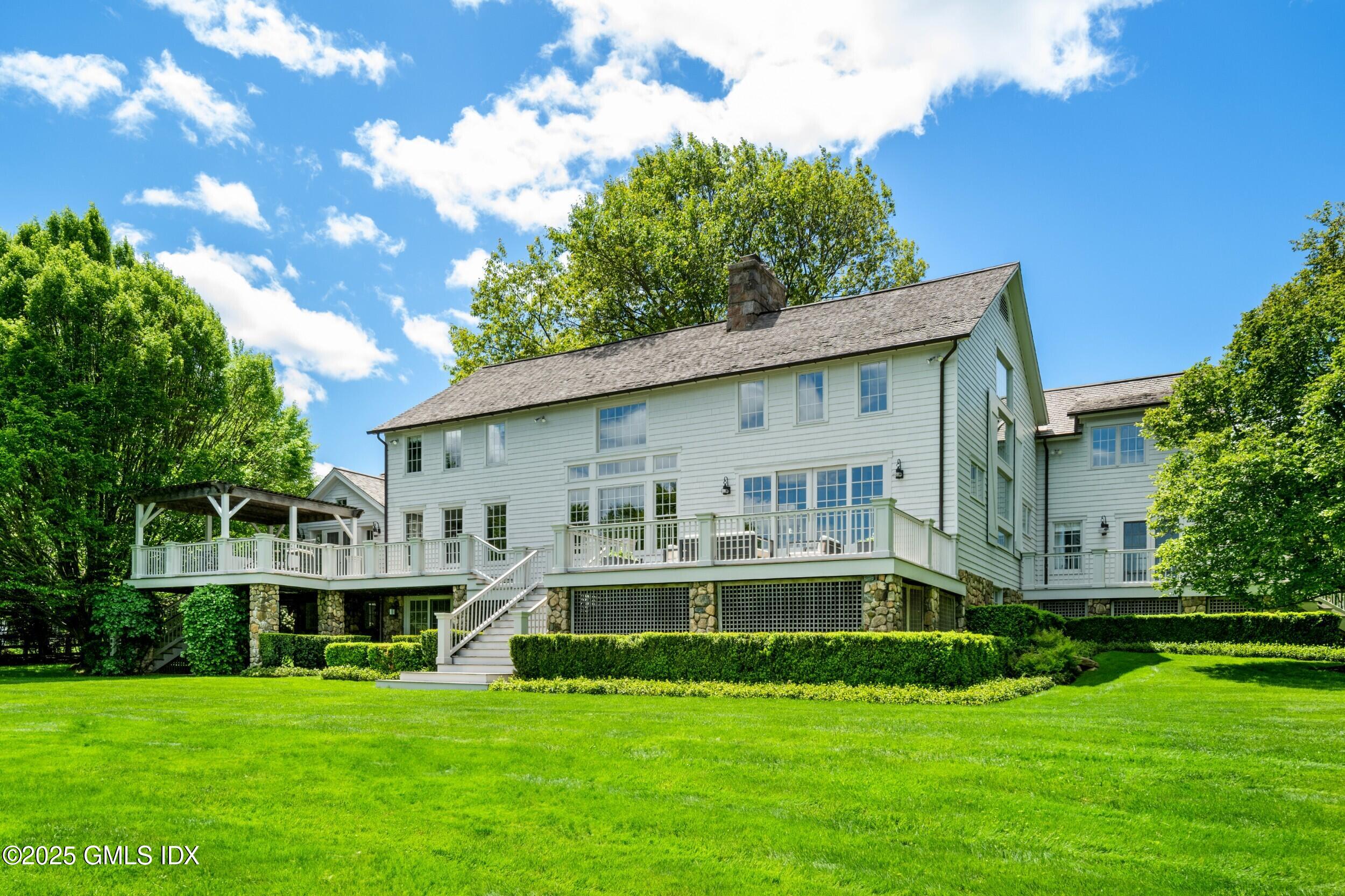 945 Oenoke Ridge New Canaan, CT 06840 - Photo 11 of 94 1.36 Rear Yard (1)