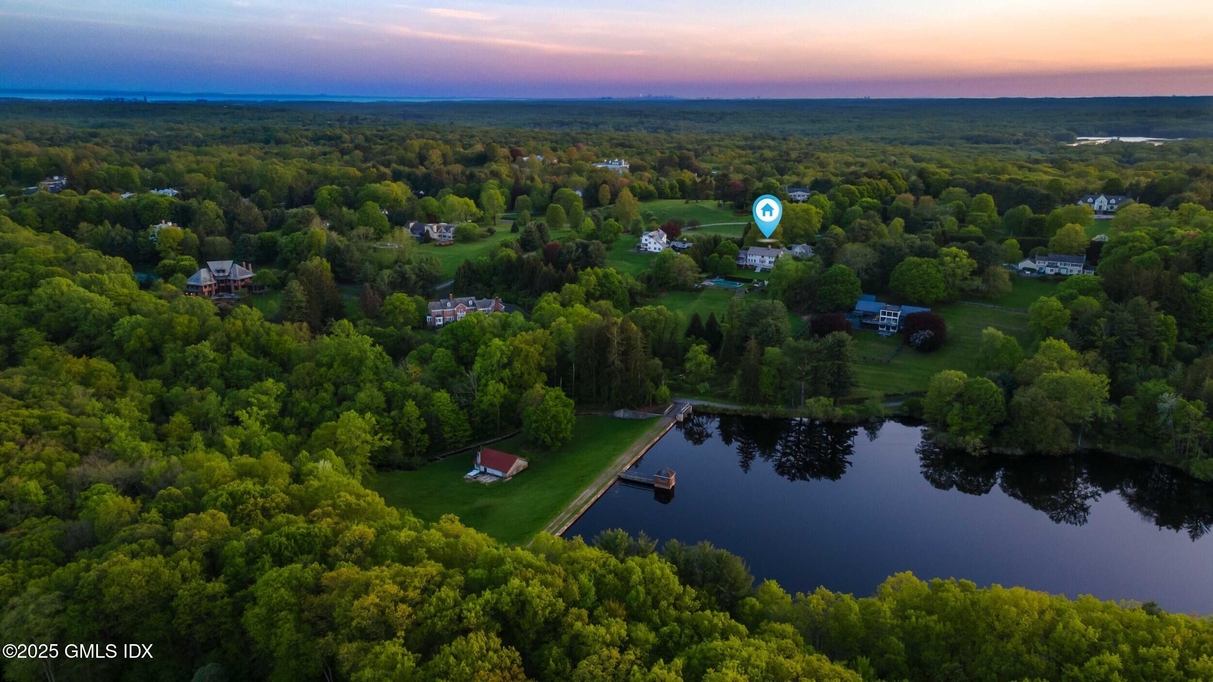 945 Oenoke Ridge New Canaan, CT 06840 - Photo 14 of 94 1.54 Resevoir Skyline Twilight only pin
