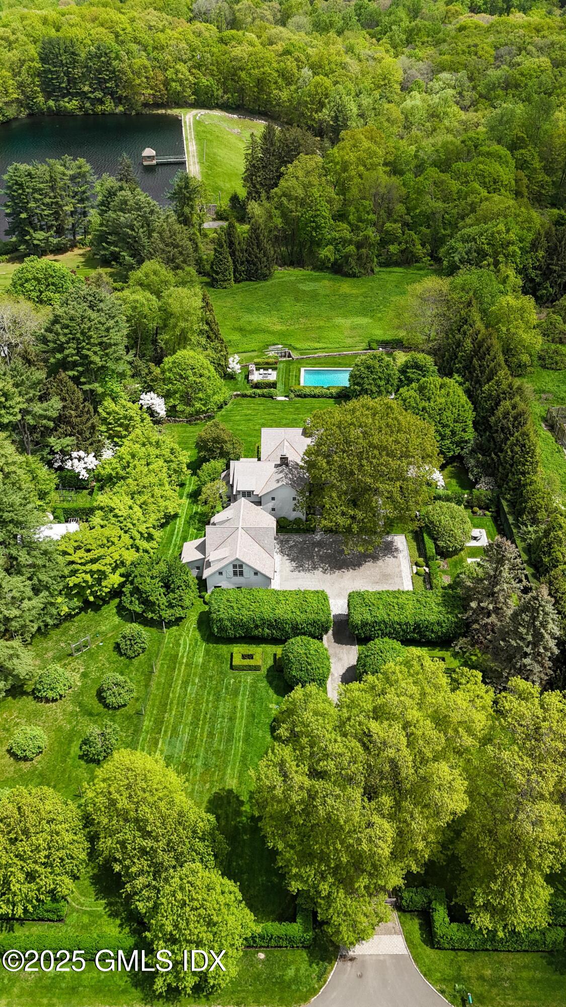 945 Oenoke Ridge New Canaan, CT 06840 - Photo 5 of 94 1.19 Front Aerial (7) EDIT-2