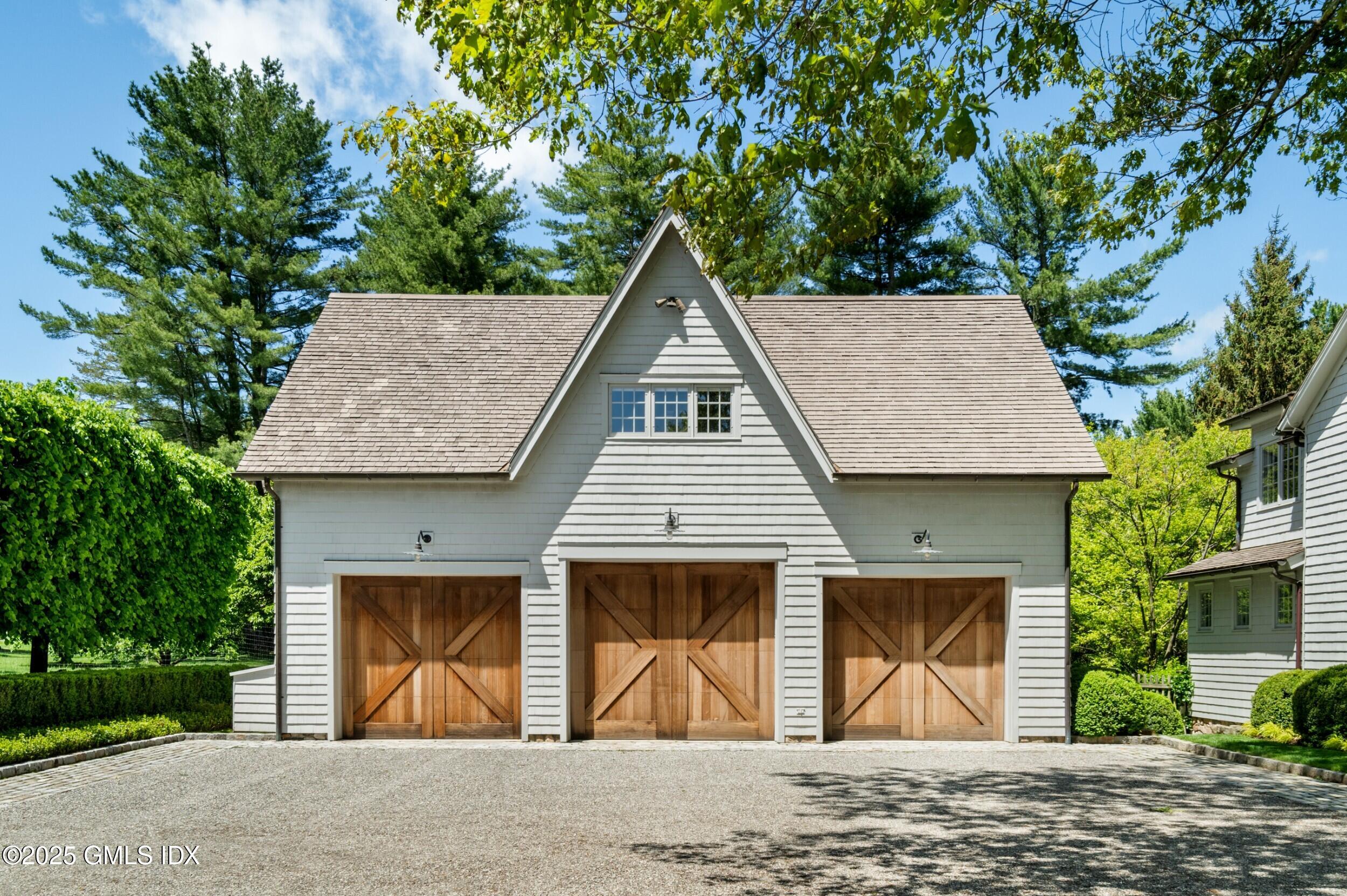 945 Oenoke Ridge New Canaan, CT 06840 - Photo 63 of 94 a house with a outdoor space
