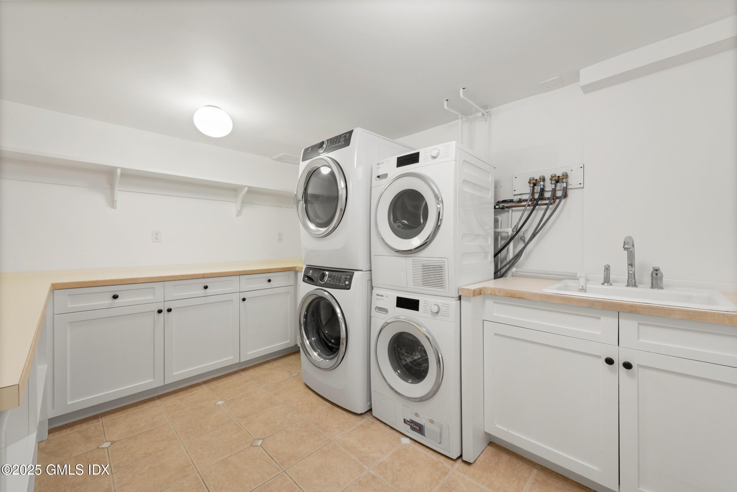 945 Oenoke Ridge New Canaan, CT 06840 - Photo 69 of 94 4.82Laundry Room