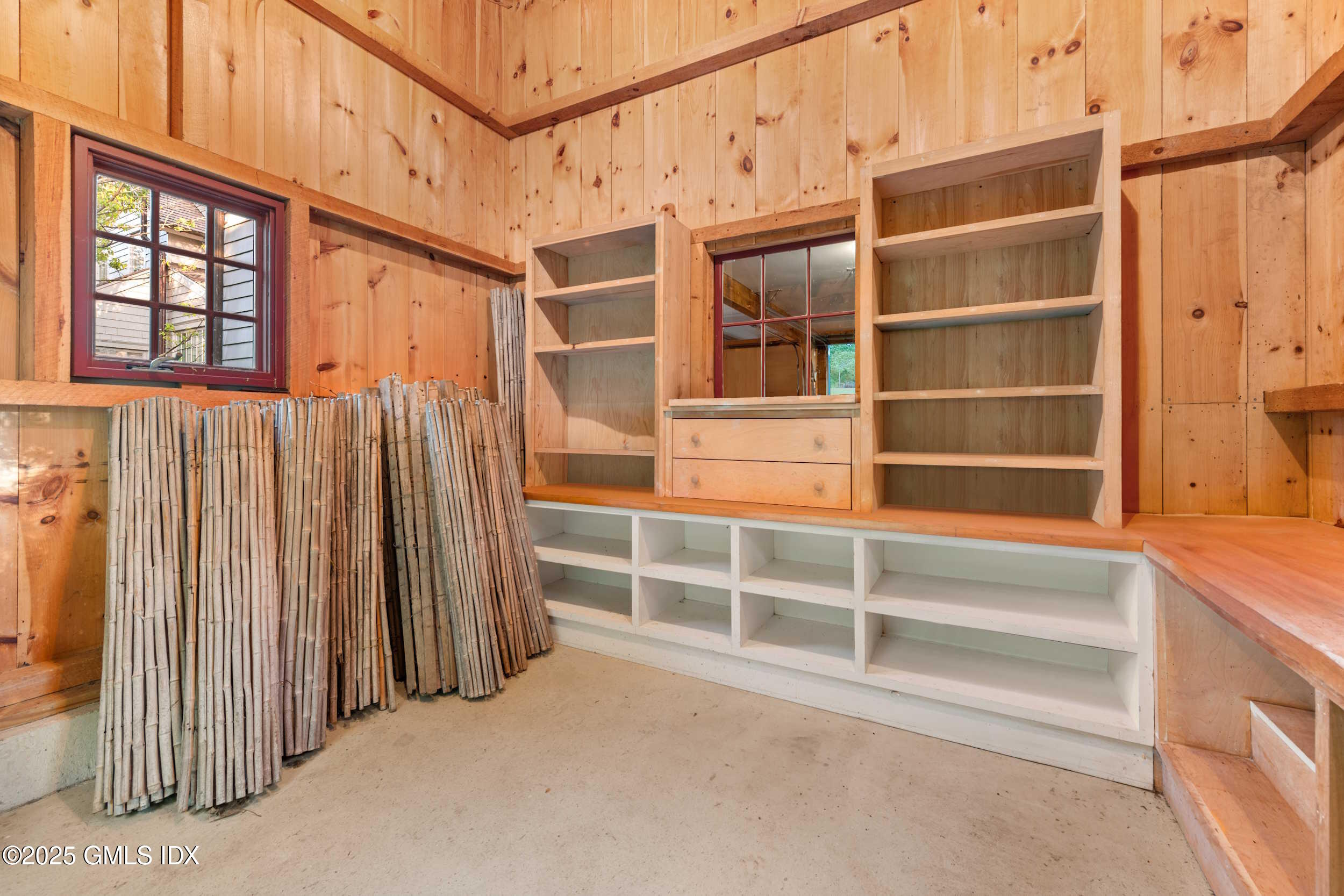 945 Oenoke Ridge New Canaan, CT 06840 - Photo 72 of 94 a view of an empty room with a window