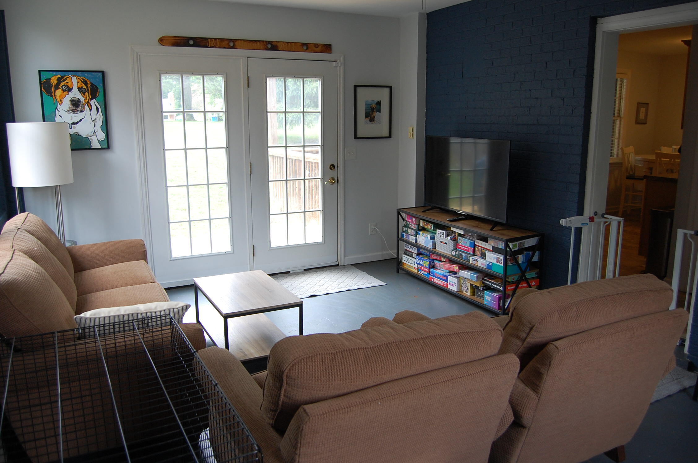 2707 Spring Road Southwest Roanoke, VA 24015 - Photo 11 of 23 a living room with furniture a flat screen tv and a window