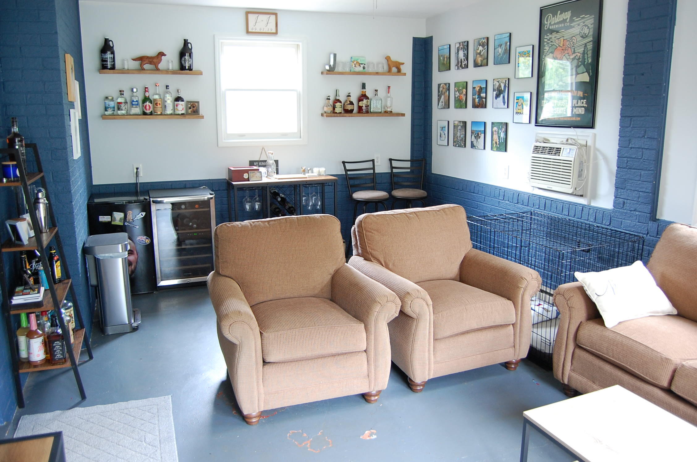 2707 Spring Road Southwest Roanoke, VA 24015 - Photo 10 of 23 a living room with furniture and a bookshelf