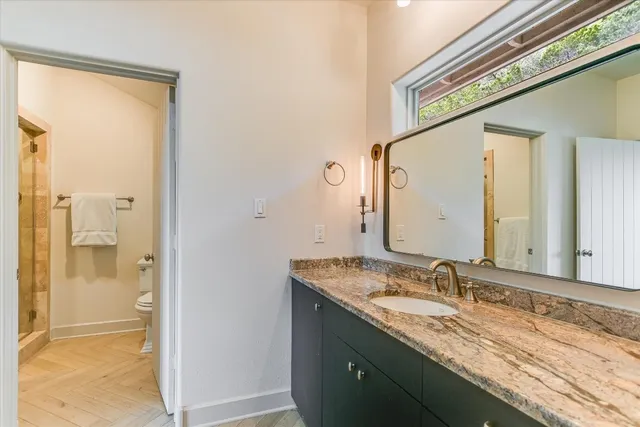 a bath tub sitting in a bathroom next to a window