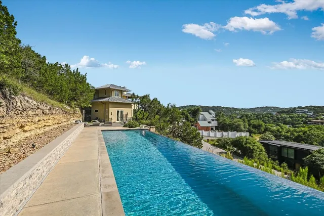 a view of a yard with an outdoor space and trampoline