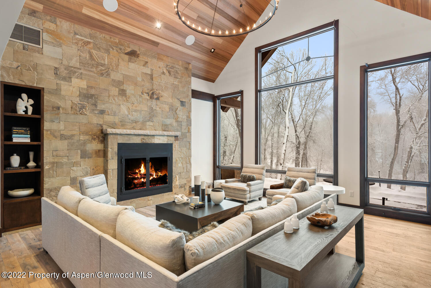 80 River Bend Road Snowmass, CO 81654 - Photo 7 of 39 a living room with furniture fireplace and a large window