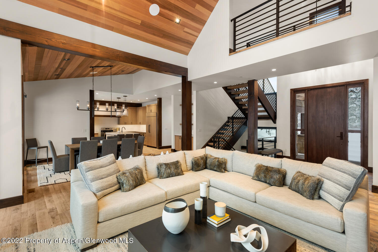 80 River Bend Road Snowmass, CO 81654 - Photo 8 of 39 a living room with furniture and a wooden floor