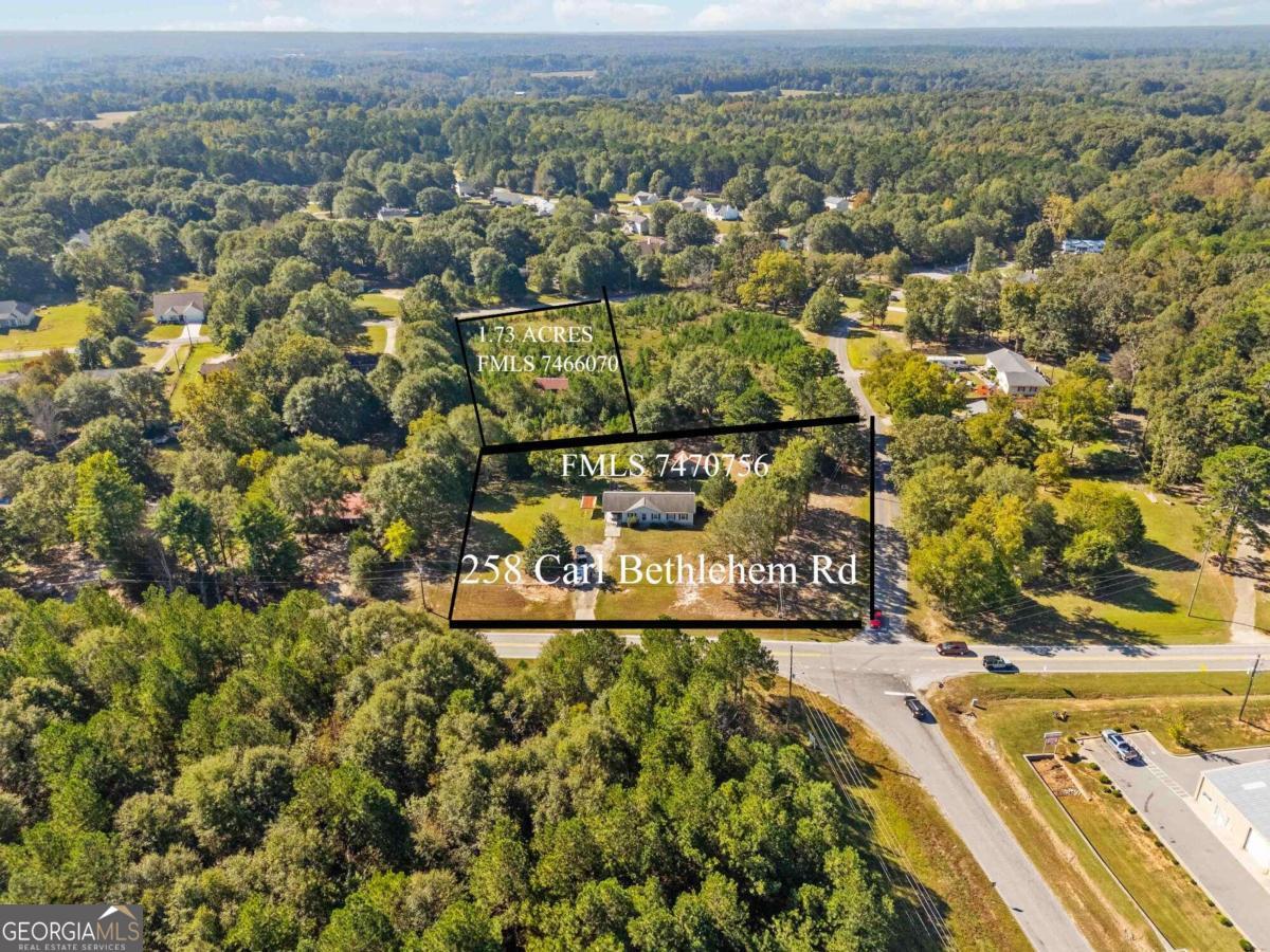 0 Harvey Lokey Road Bethlehem, GA 30620 - Photo 1 of 1 an aerial view of residential houses with outdoor space