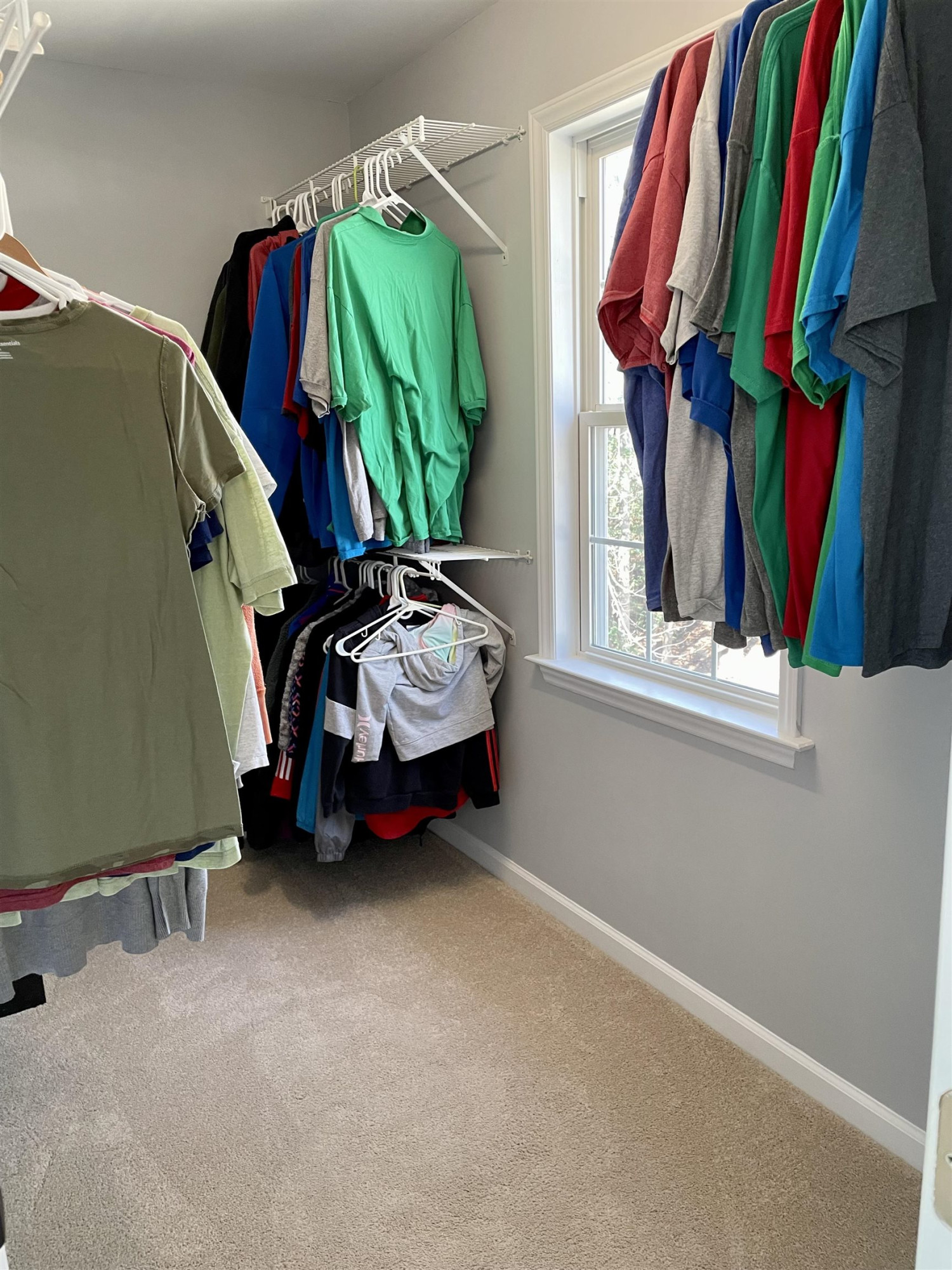 128 Deerview Drive Willow Spring, NC 27592 - Photo 20 of 34 a view of walk in closet with clothes and shoes