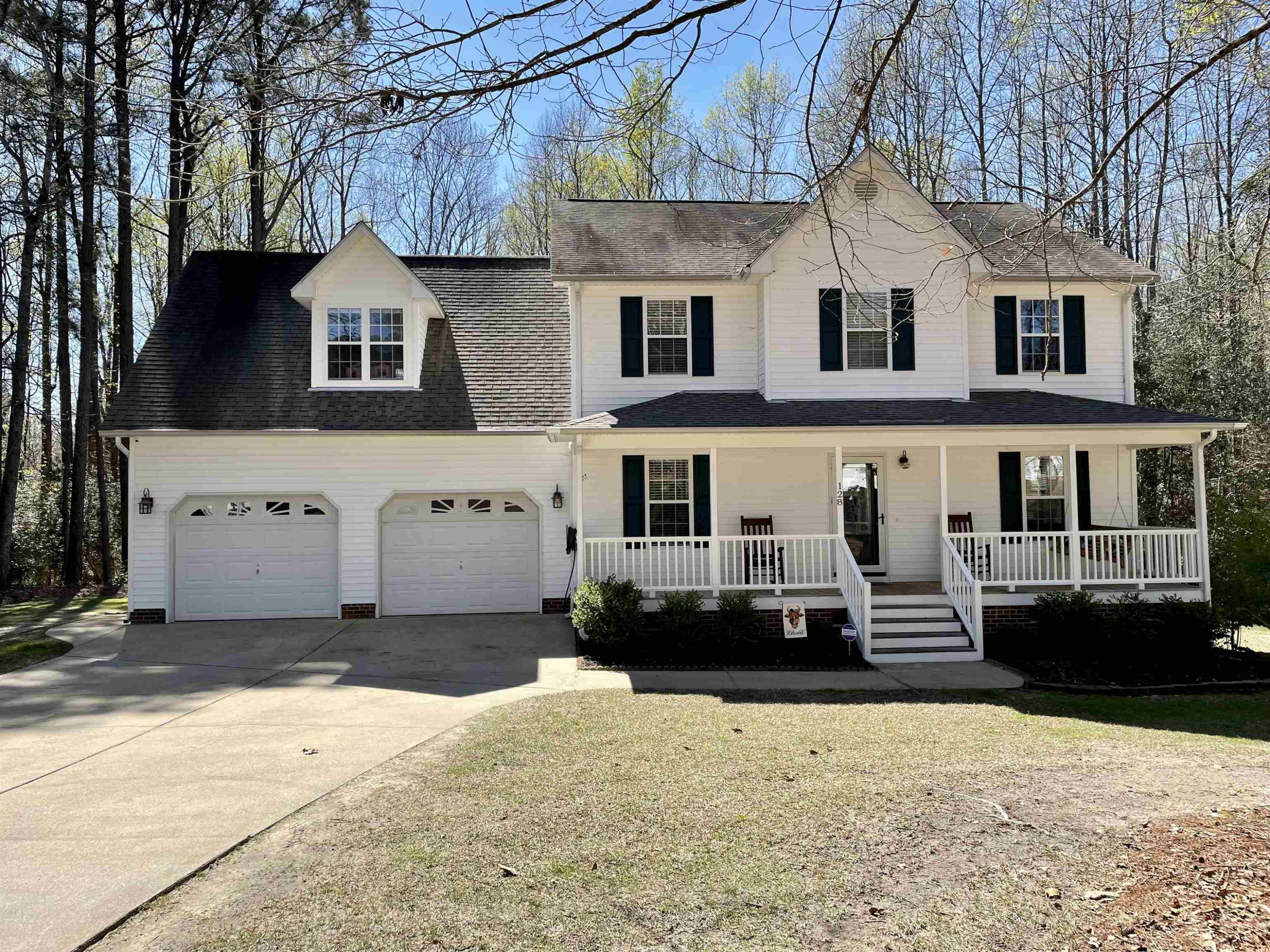 128 Deerview Drive Willow Spring, NC 27592 - Photo 2 of 34 a front view of a house with a yard