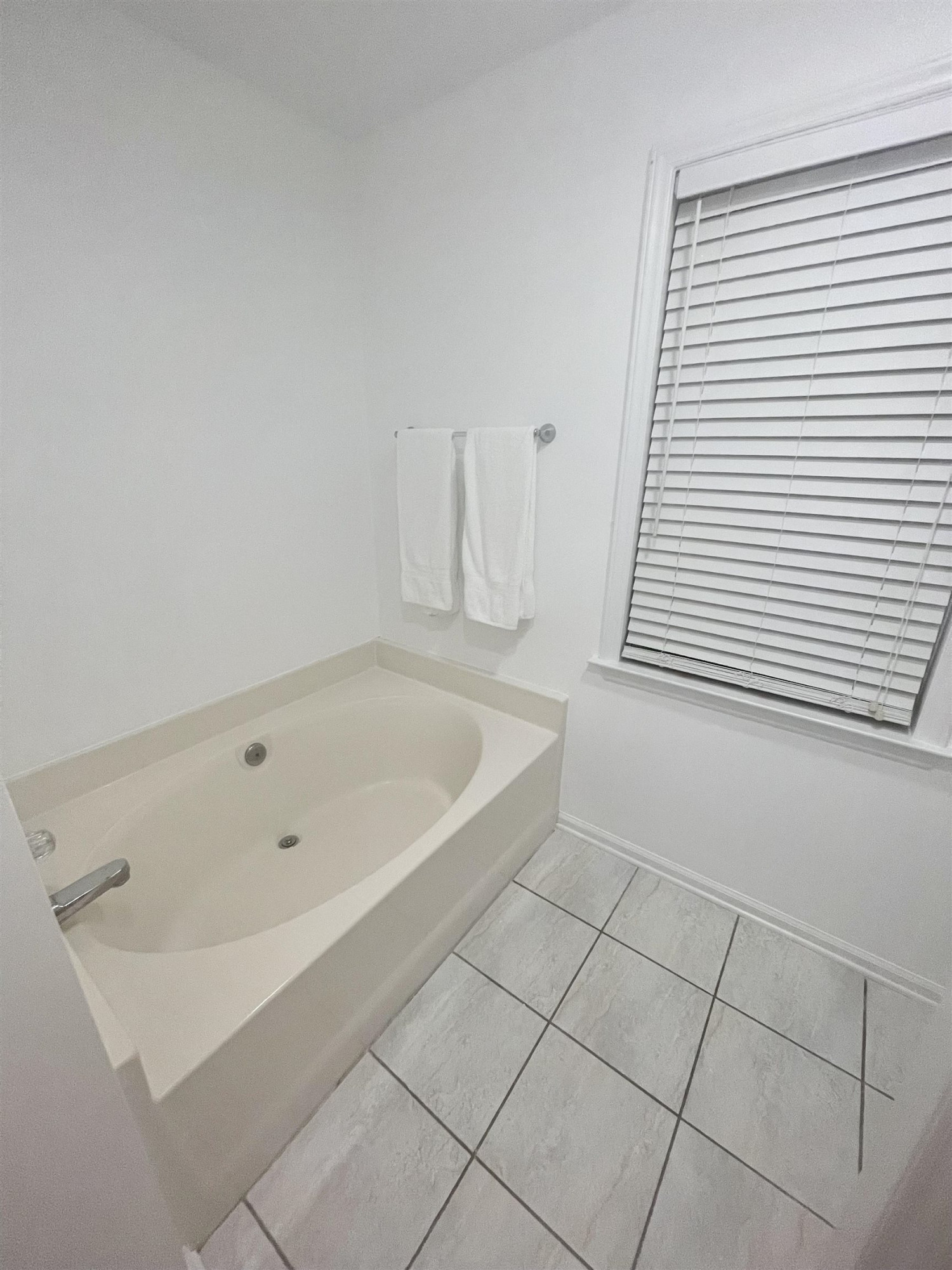 128 Deerview Drive Willow Spring, NC 27592 - Photo 23 of 34 a white bath tub sitting next to a white sink