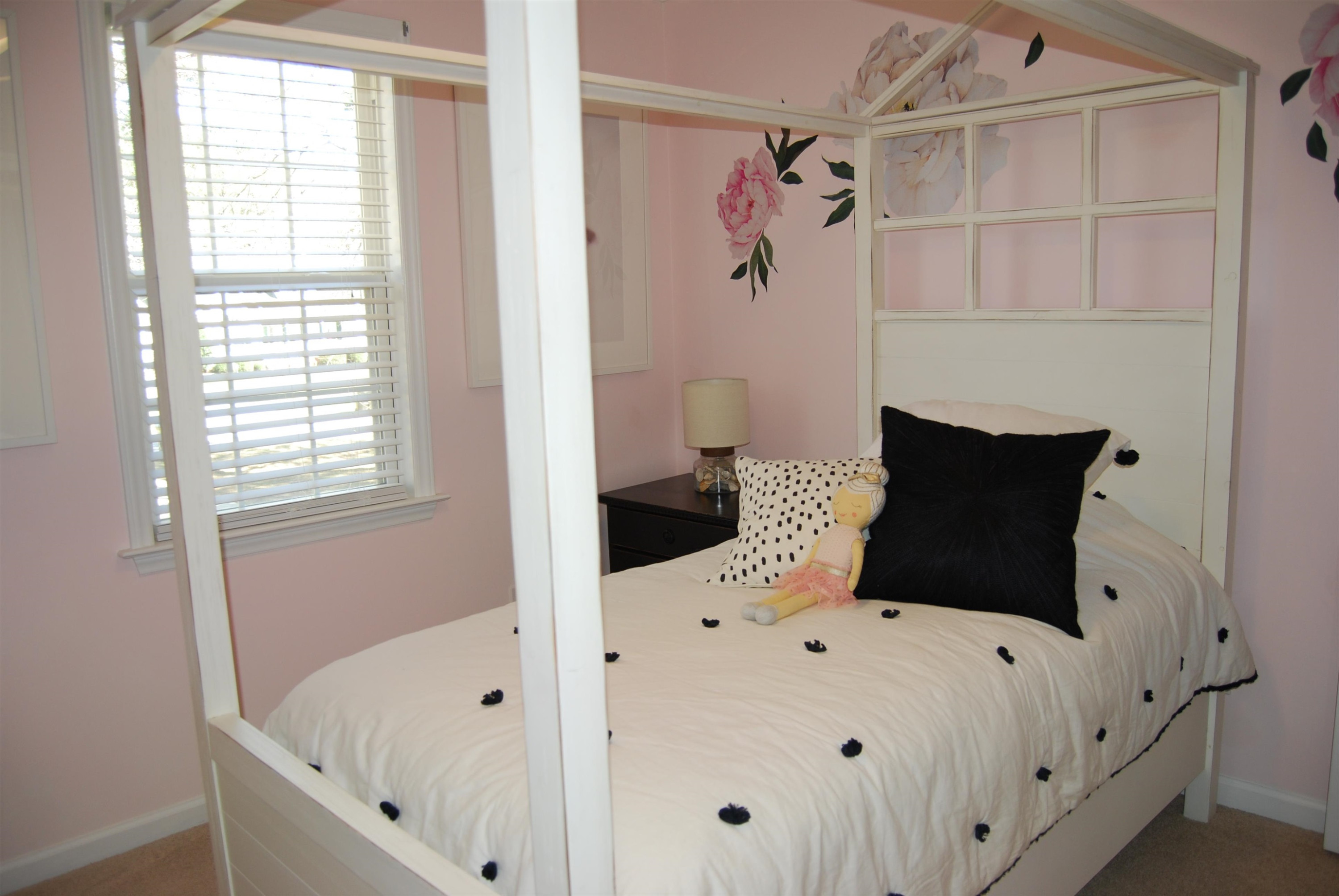 128 Deerview Drive Willow Spring, NC 27592 - Photo 24 of 34 a white bed sitting in a bedroom next to a window