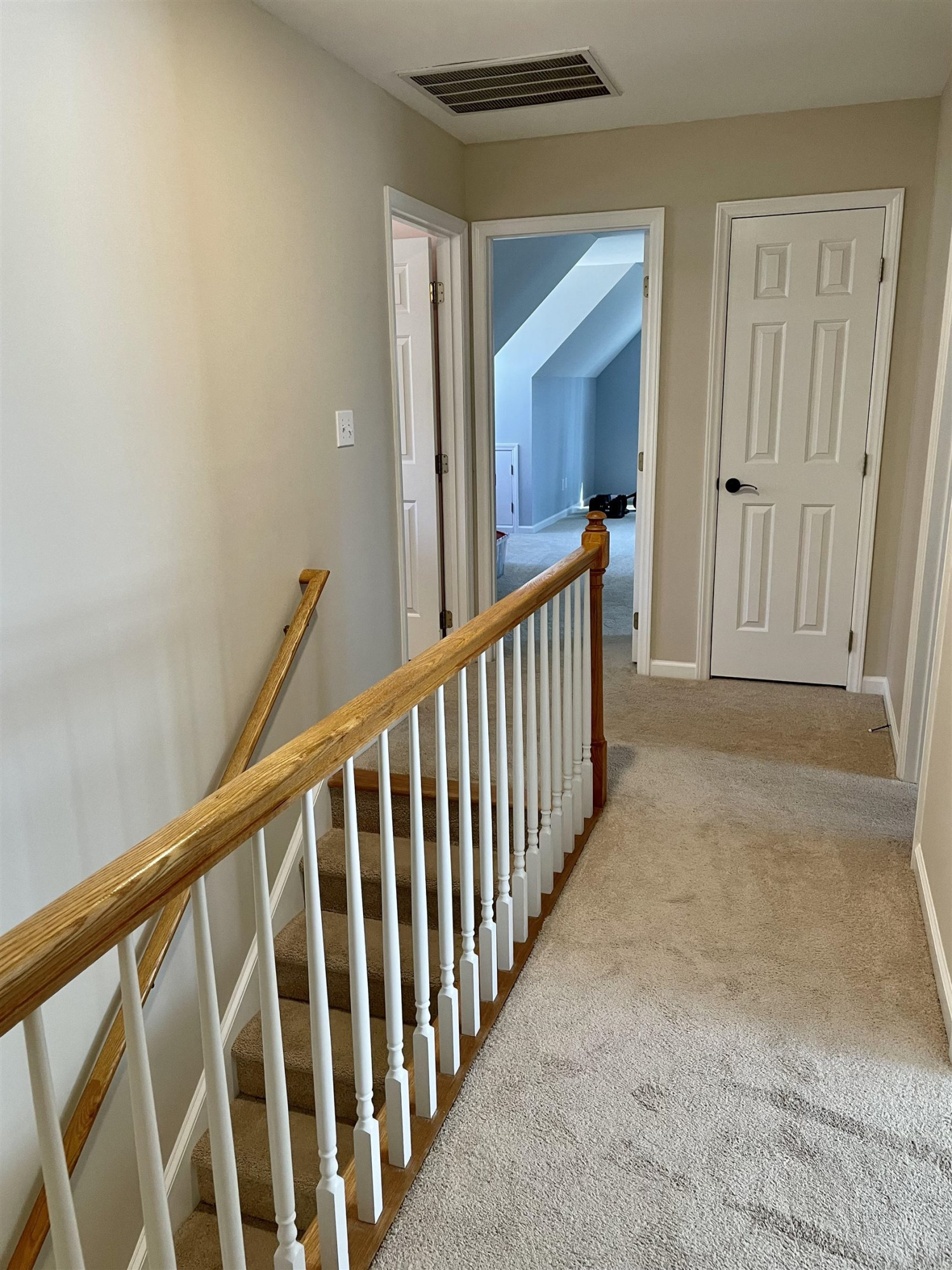 128 Deerview Drive Willow Spring, NC 27592 - Photo 30 of 34 a view of a hallway with wooden floor and entryway