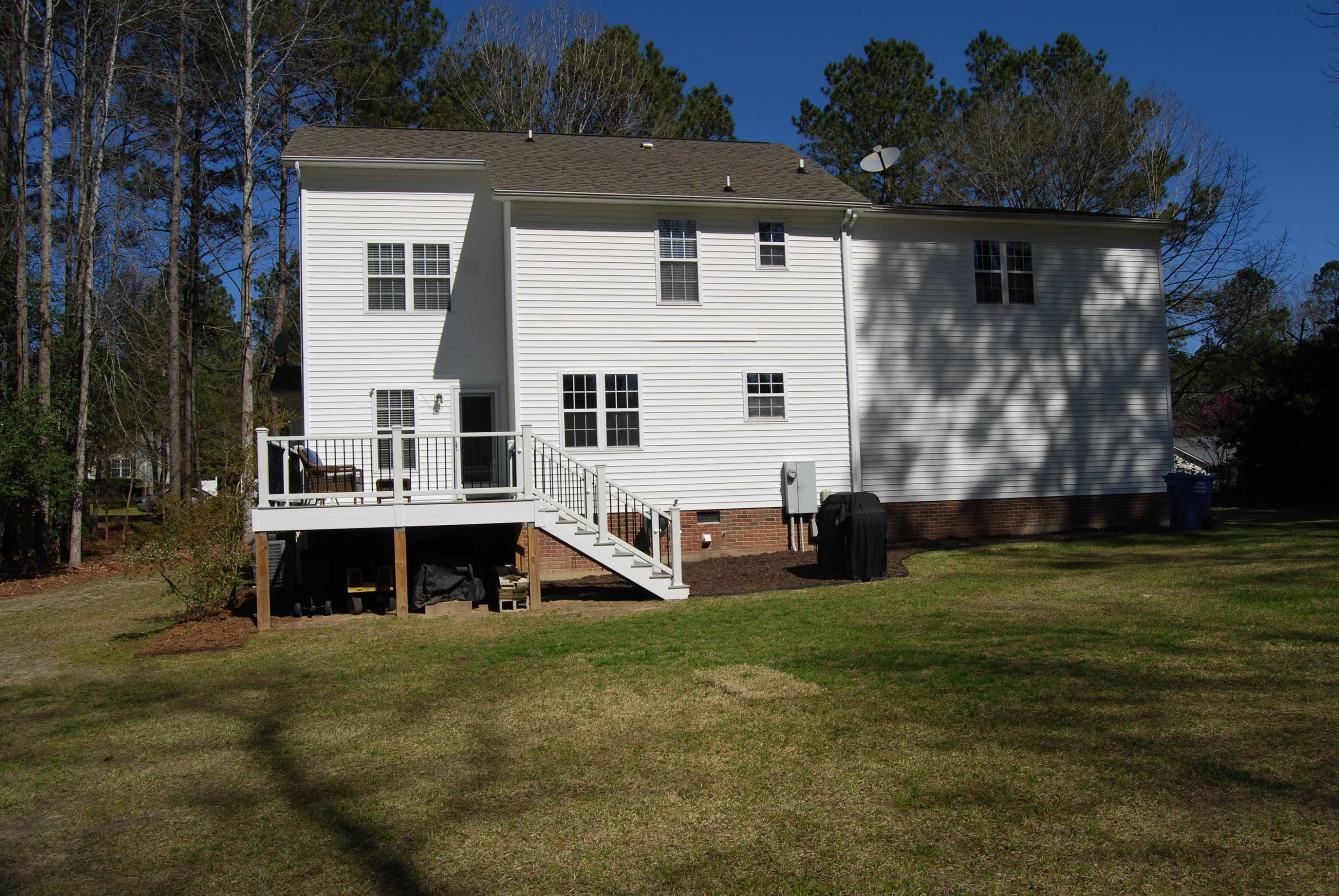 128 Deerview Drive Willow Spring, NC 27592 - Photo 31 of 34 a view of a house with a yard