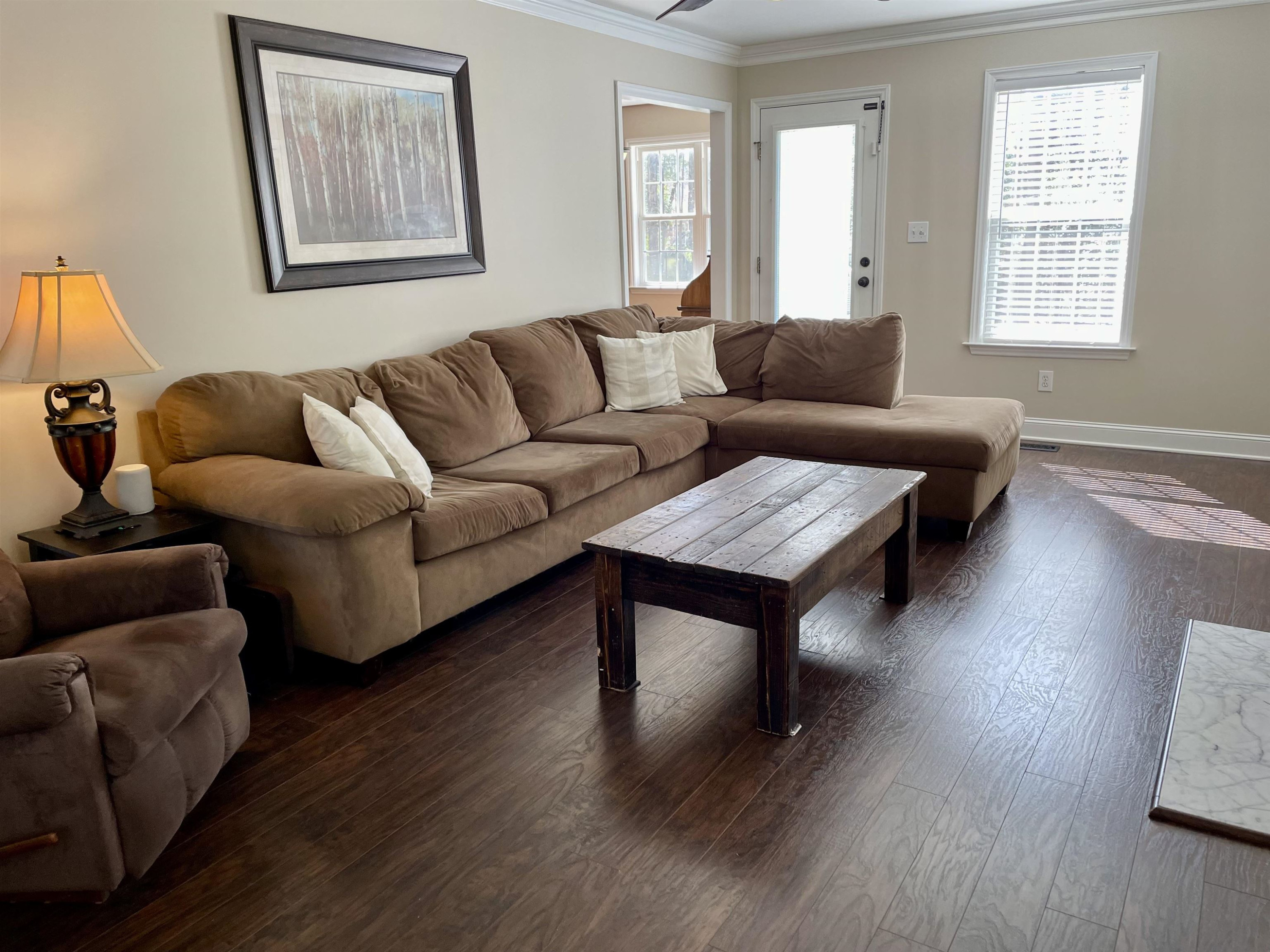 128 Deerview Drive Willow Spring, NC 27592 - Photo 9 of 34 a living room with furniture and a hard wood floor