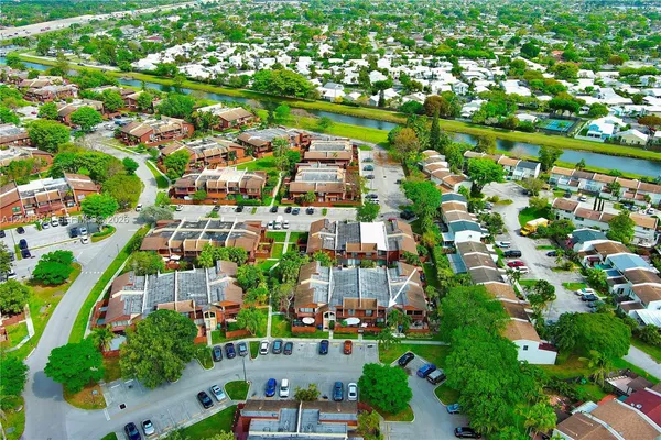 a view of a city with lots of green space
