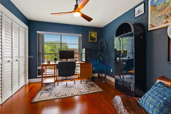 a living room with furniture rug and window