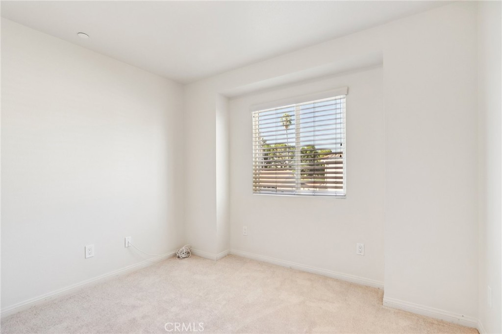 12106 Old River School Road, Unit G Downey, CA 90242 - Photo 13 of 22 an empty room with windows