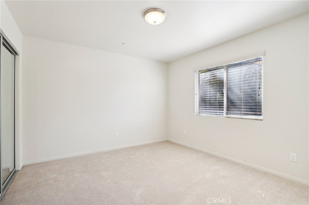 12106 Old River School Road, Unit G Downey, CA 90242 - Photo 16 of 22 an empty room with windows