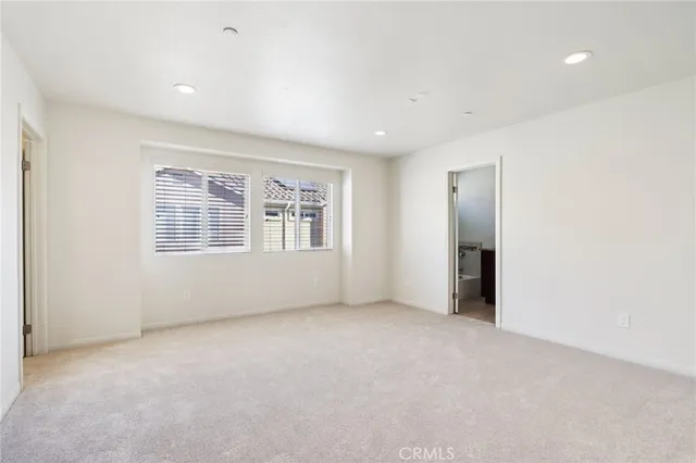 a bathroom with a granite countertop sink mirror toilet and shower