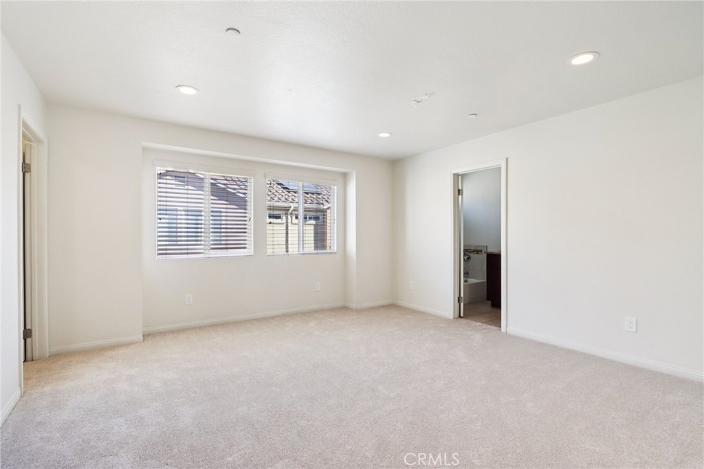 12106 Old River School Road, Unit G Downey, CA 90242 - Photo 10 of 22 an empty room with windows