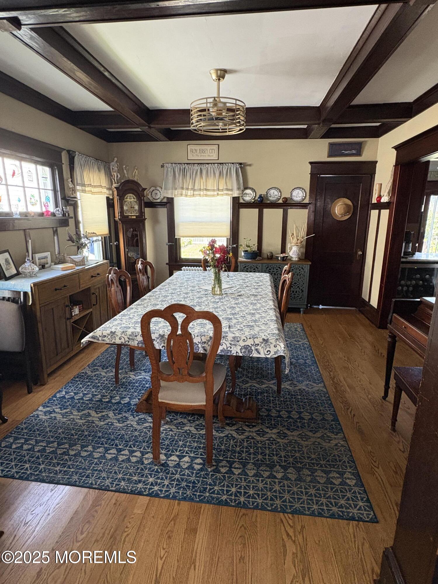 414 Washington Avenue Avon-by-the-Sea, NJ 07717 - Photo 16 of 19 a table room with stainless steel appliances furniture rug and wooden floor