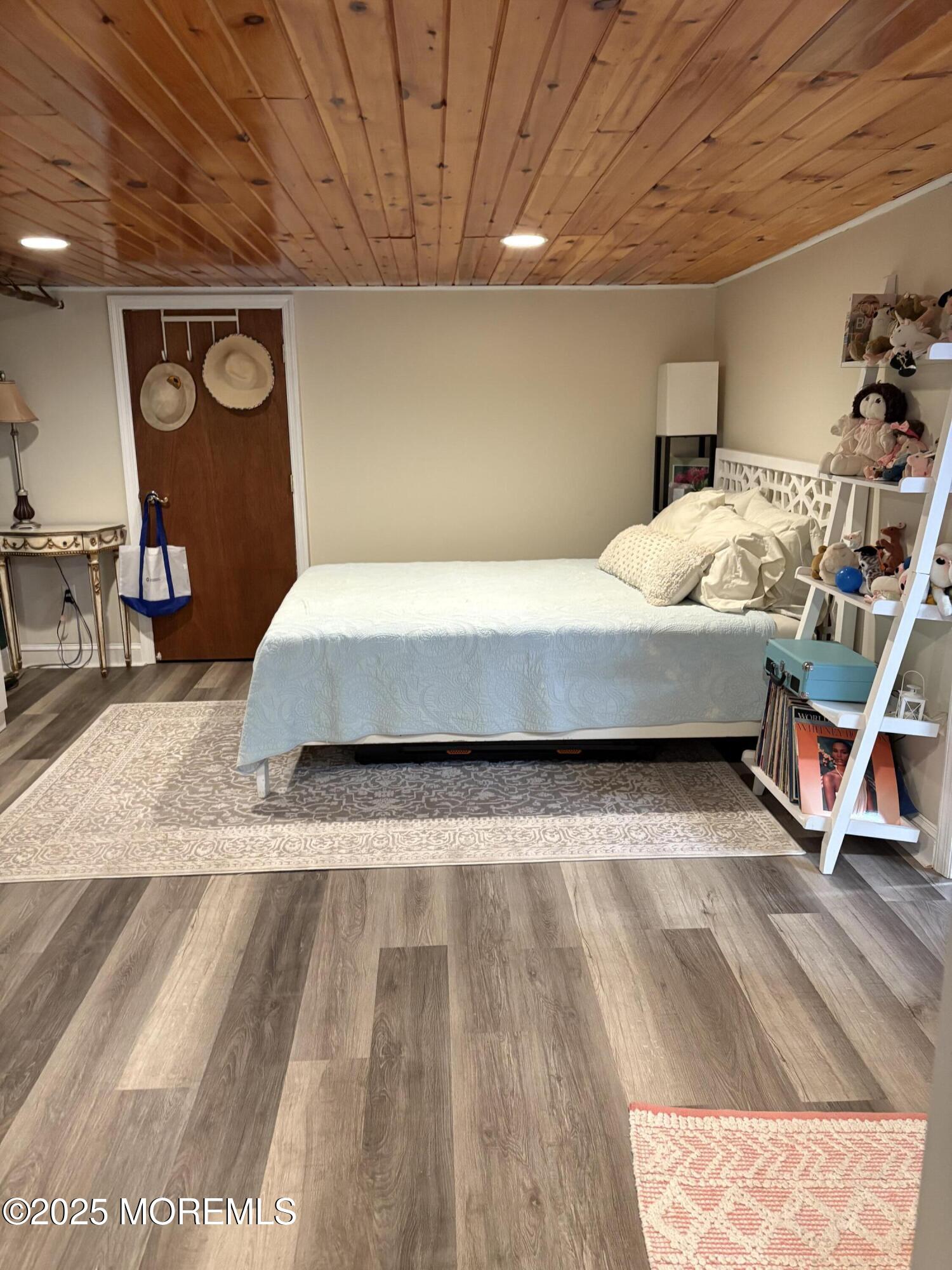 414 Washington Avenue Avon-by-the-Sea, NJ 07717 - Photo 17 of 19 a living room with furniture and wooden floor