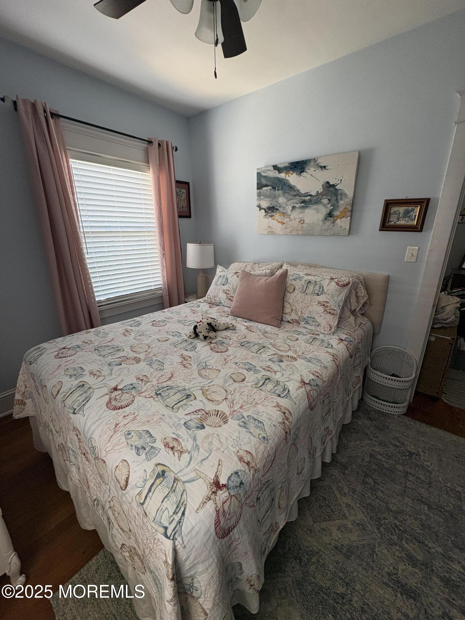 414 Washington Avenue Avon-by-the-Sea, NJ 07717 - Photo 7 of 19 a bedroom with bed and window