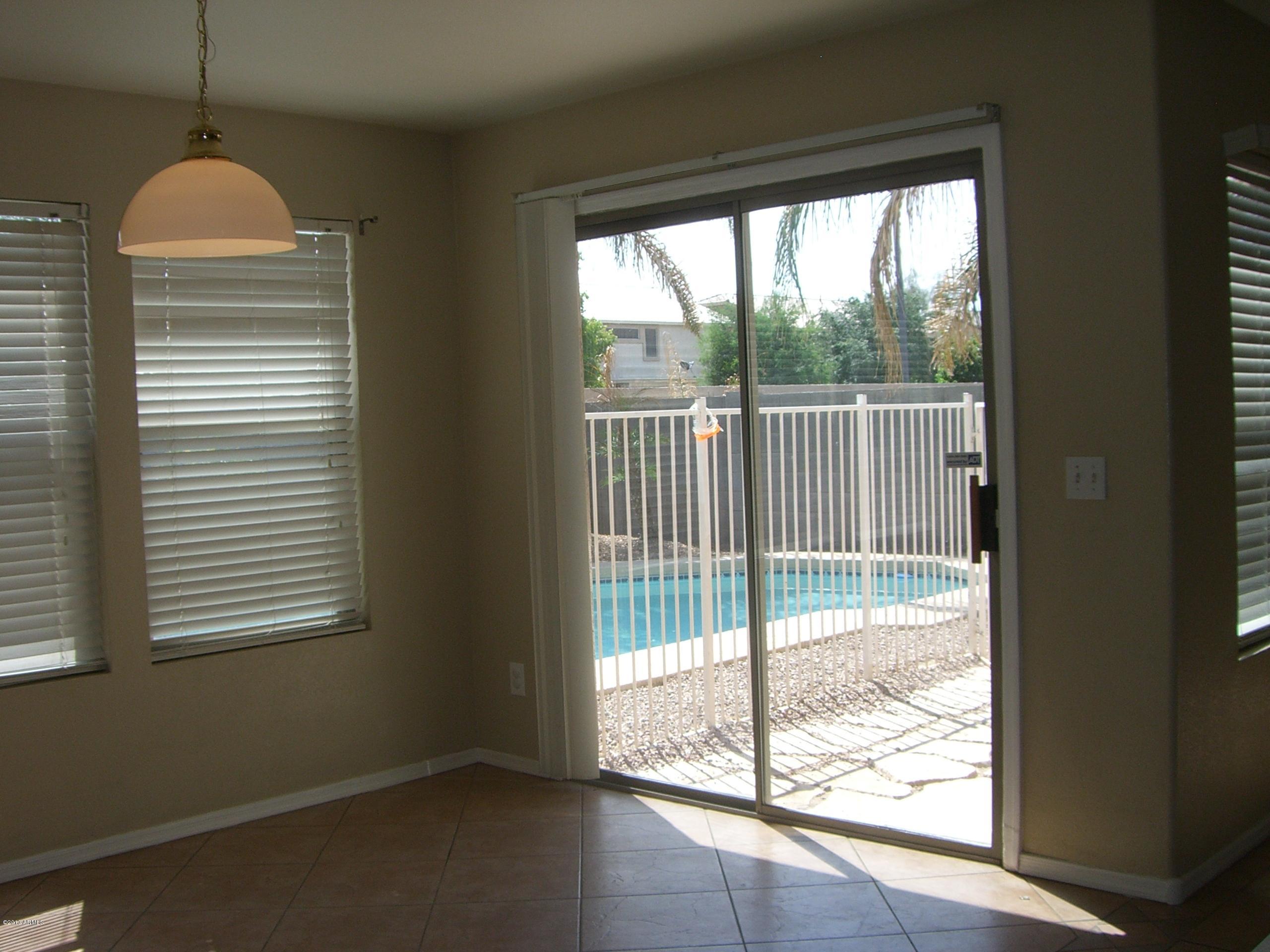3281 South Martingale Road Gilbert, AZ 85297 - Photo 7 of 34 PATIO DOOR FROM THE BREAKFAST ROOM