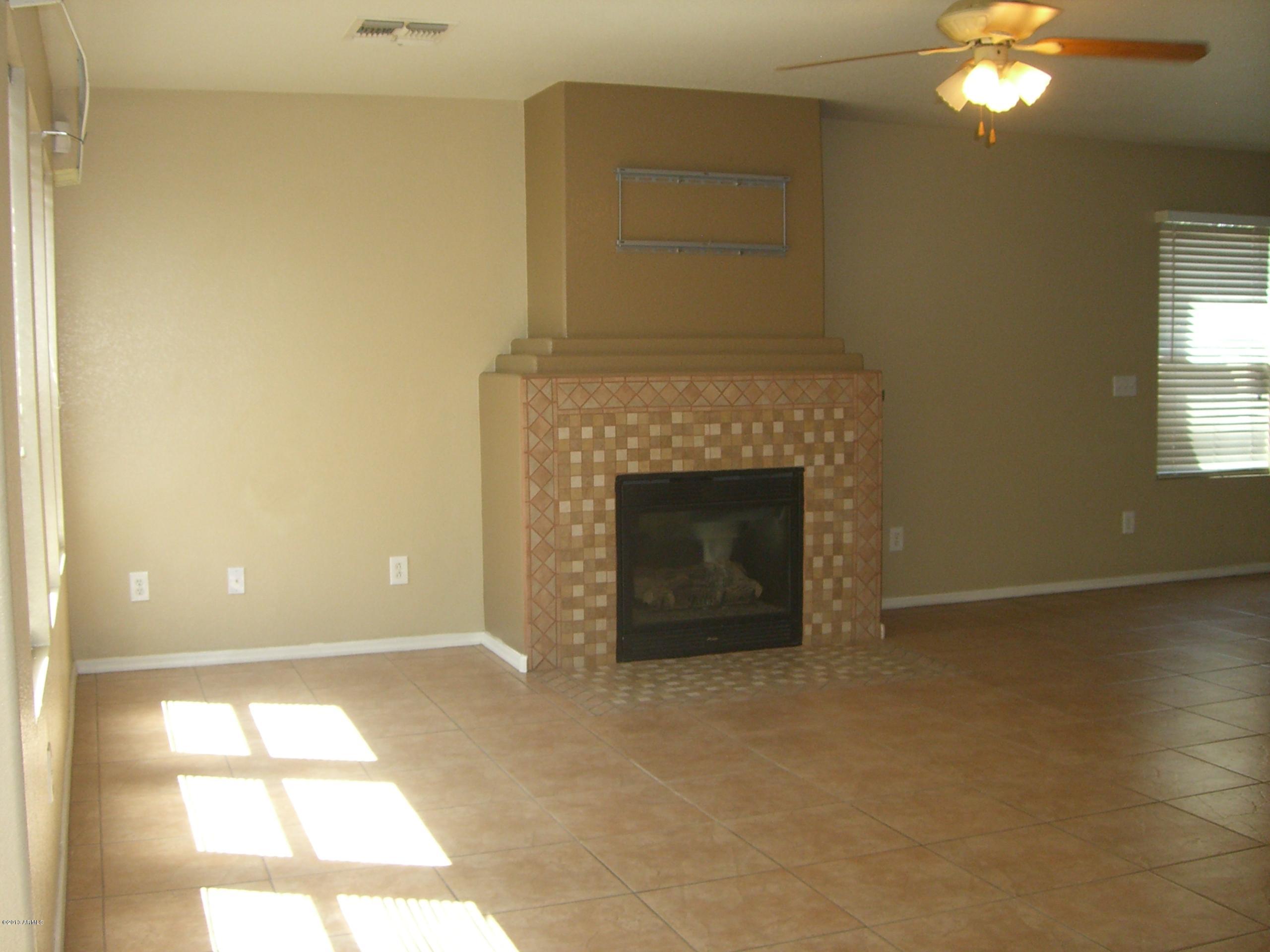 3281 South Martingale Road Gilbert, AZ 85297 - Photo 9 of 34 TILE EVERYWHERE EXCEPT BEDROOMS & LOFT