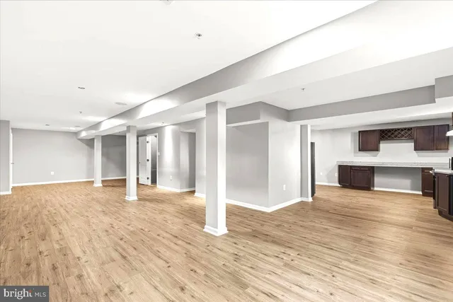 a view of a livingroom with wooden floor