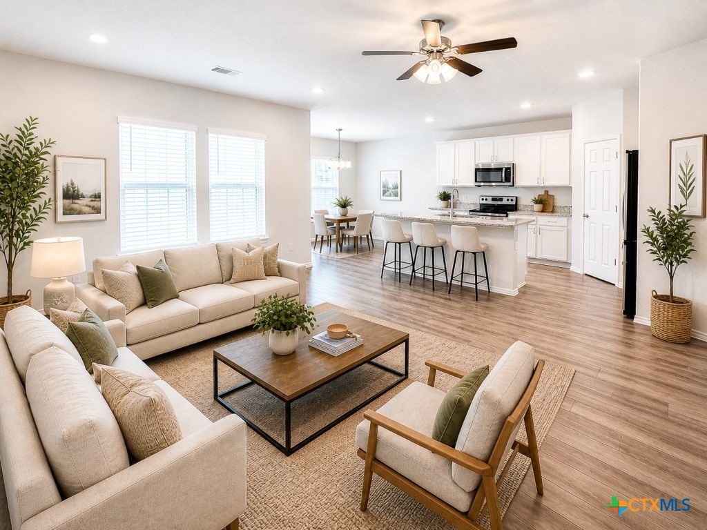 1507 Merritt Road Temple, TX 76504 - Photo 4 of 15 a living room with furniture kitchen view and a wooden floor