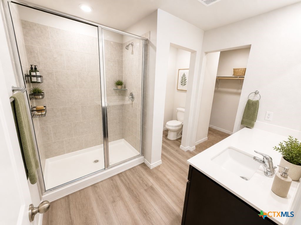 1507 Merritt Road Temple, TX 76504 - Photo 8 of 15 a bathroom with a shower and a sink